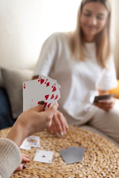 friends havinf fun while playing poker