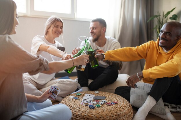 Friends havinf fun while playing poker