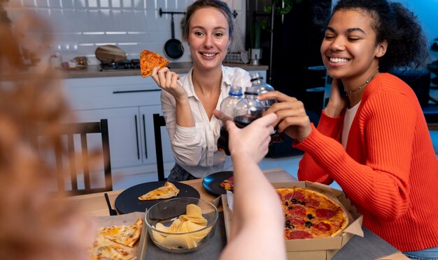 Friends having a crowded party at home