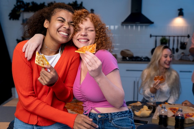 Friends having a crowded party at home