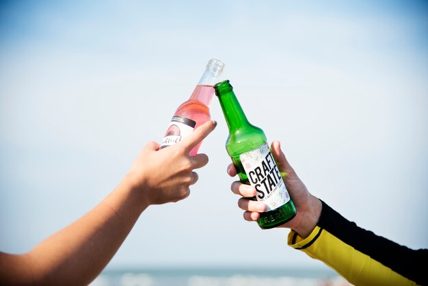 Friends having a drink at the beach