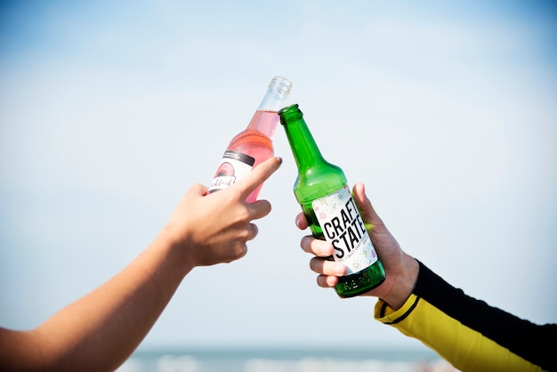 Friends having a drink at the beach