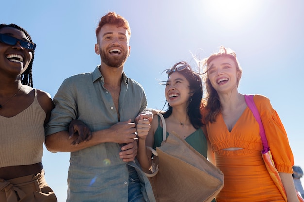 Friends having fun by the sea side