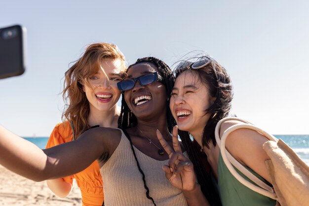 Friends having fun by the sea side