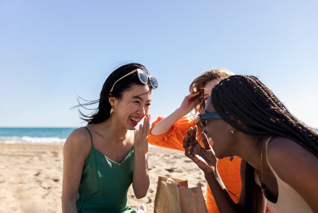 Friends having fun by the sea side