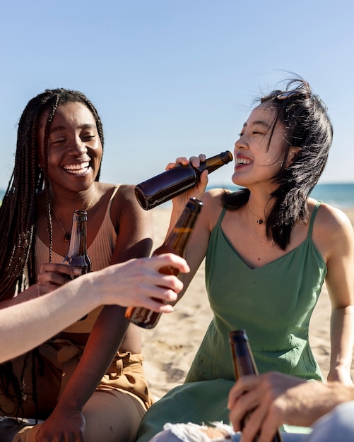 Friends having fun by the sea side