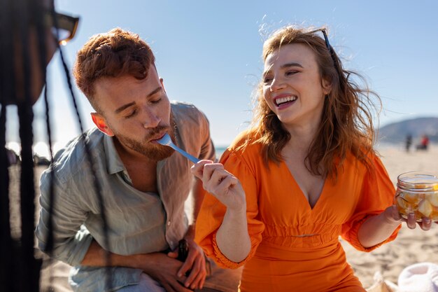 Friends having fun by the sea side