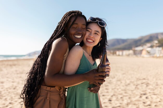 Friends having fun by the sea side