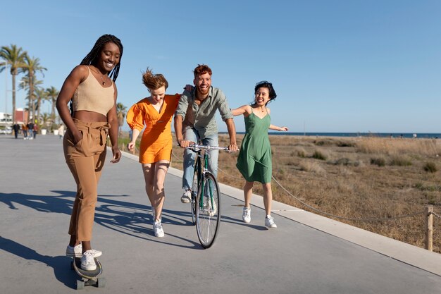 Friends having fun by the sea side