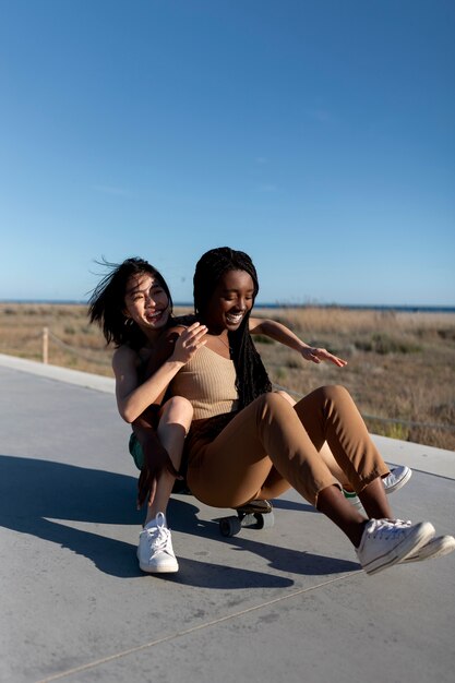 Friends having fun by the sea side