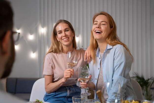 Friends having fun together while cooking