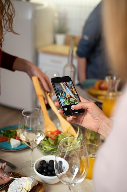 Friends having fun together while cooking