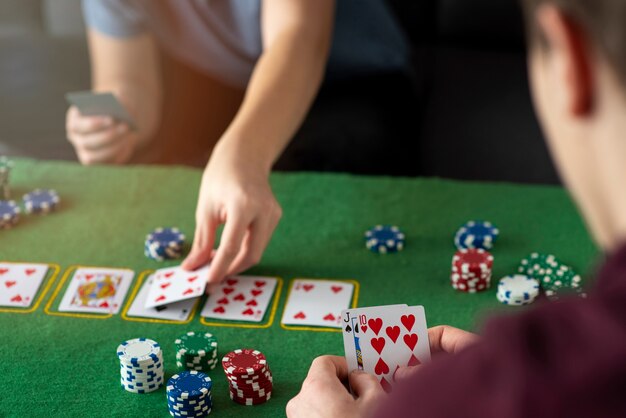 Friends having fun while playing poker