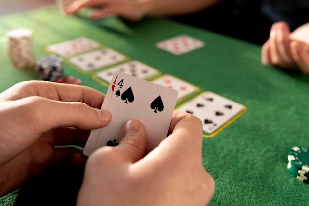 Friends having fun while playing poker