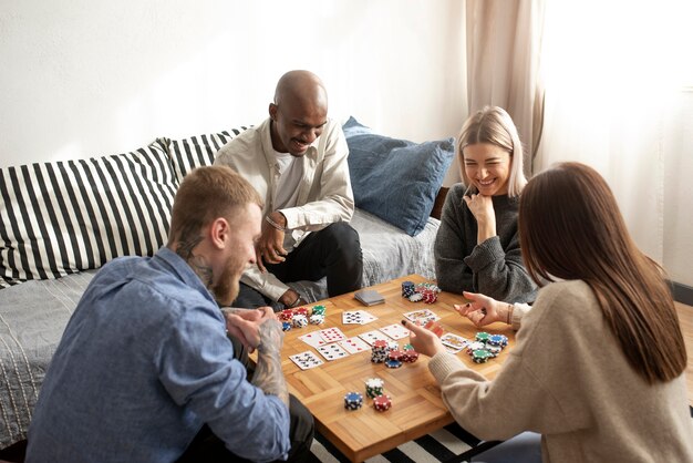 Friends having fun while playing poker