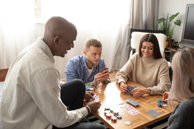 Friends having fun while playing poker