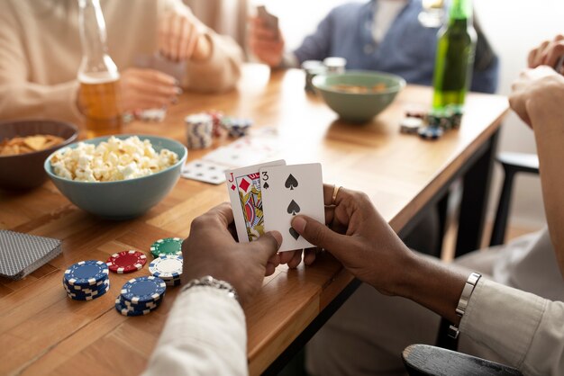 Friends having fun while playing poker