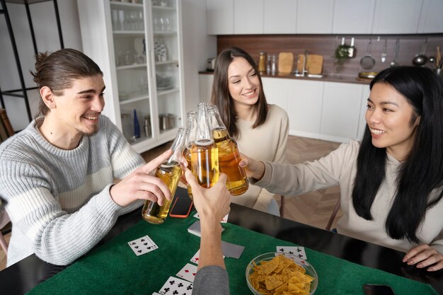 Friends having fun while playing poker