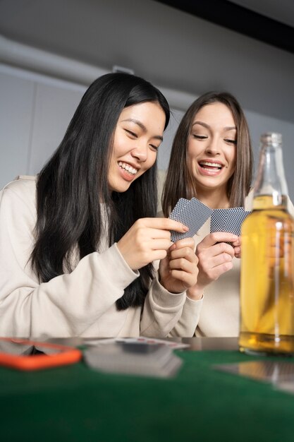 Friends having fun while playing poker