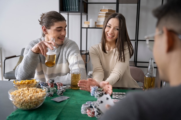 Friends having fun while playing poker