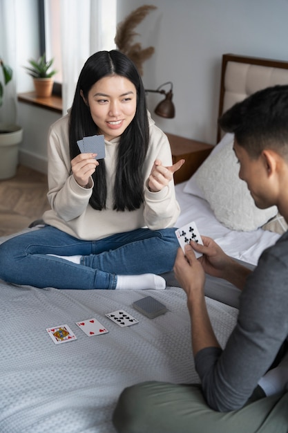 Friends having fun while playing poker