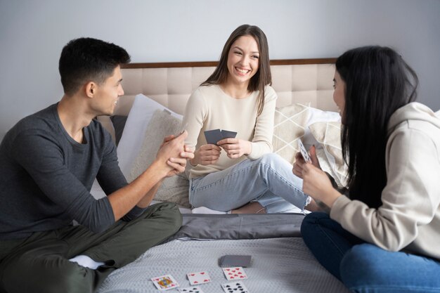 Friends having fun while playing poker