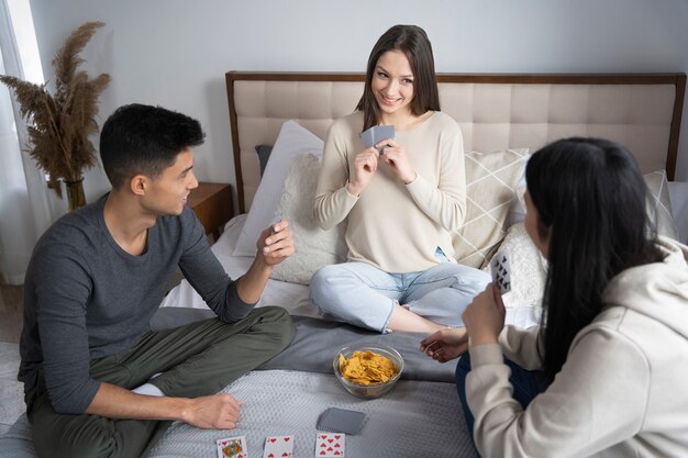 Friends having fun while playing poker