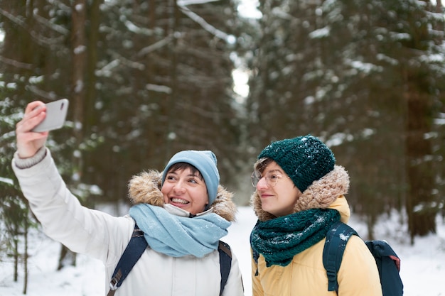 Friends having fun in the winter season