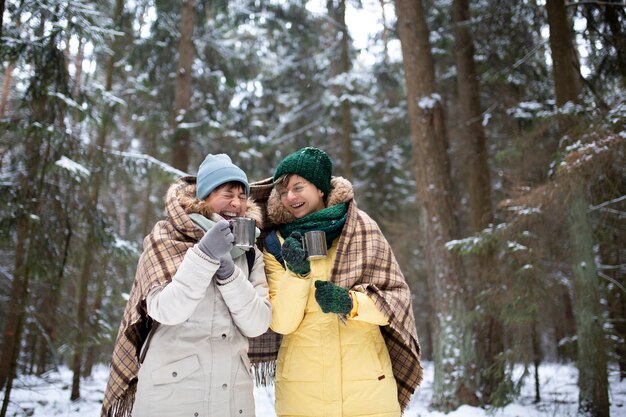 Friends having fun in the winter season