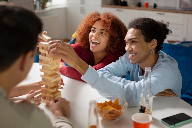 Friends having fun with traditional games