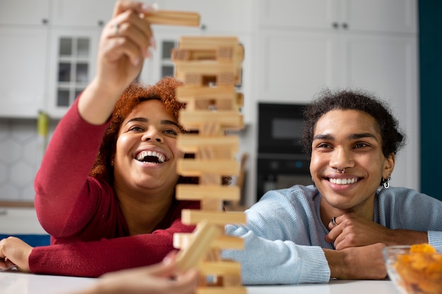 Friends having fun with traditional games