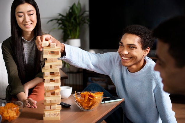 Friends having fun with traditional games