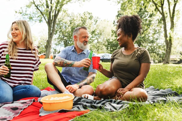 Friends having a picnic in the park