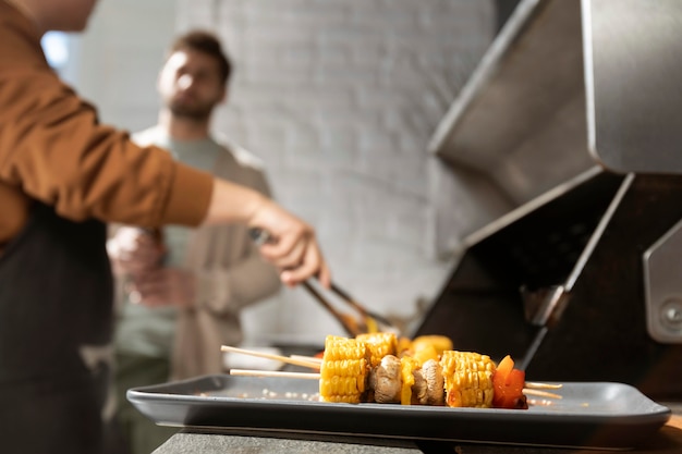 Free photo friends making barbecue close up