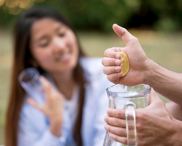 Friends making lemonade outside