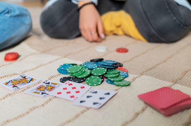 Free photo friends playing poker together