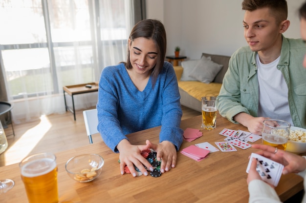 friends playing poker together