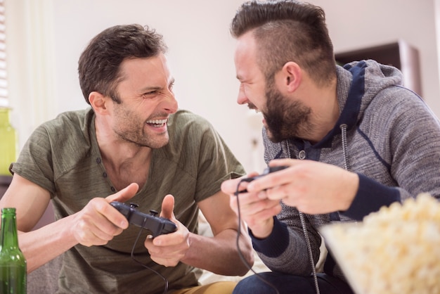 Friends playing videogames