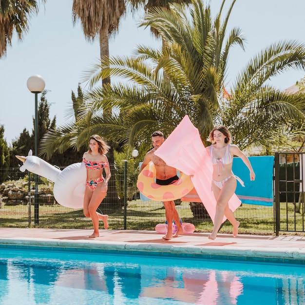 Friends next to pool