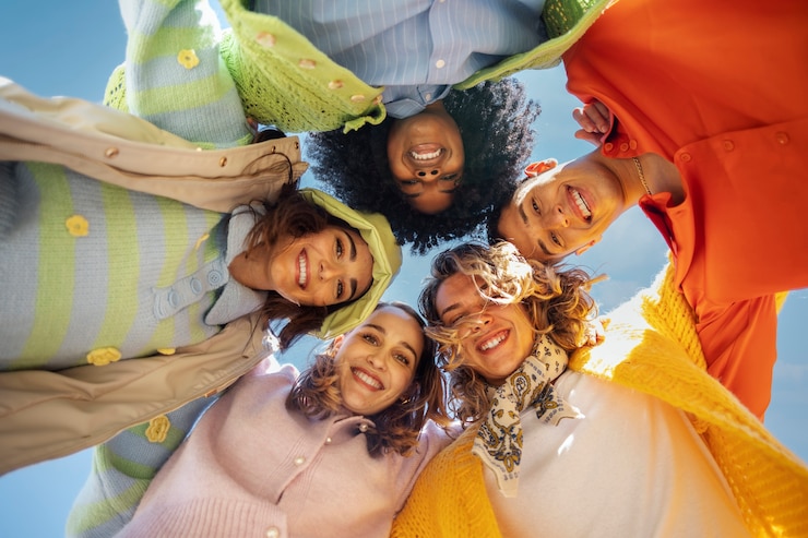 Free Photo friends posing in an outdoor field