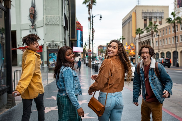 Friends posing while out in the city