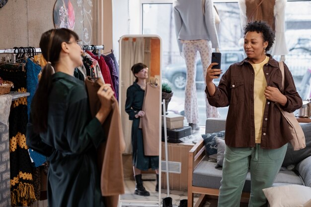 Friends shopping in second hand market