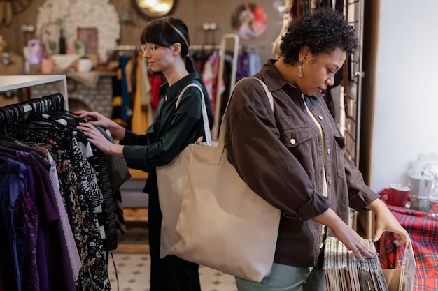 Friends shopping in second hand market