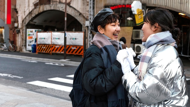 Free photo friends spending time together outside