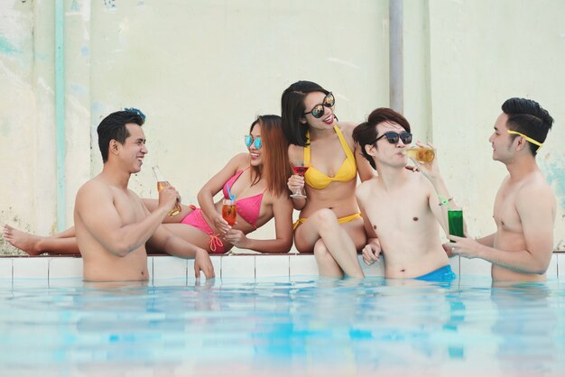 Friends at swimming pool