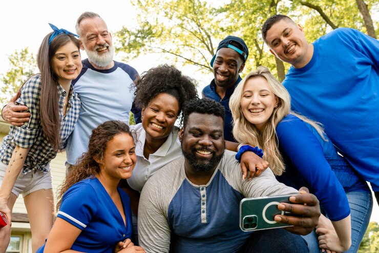 Free Photo friends taking a selfie at a tailgate party
