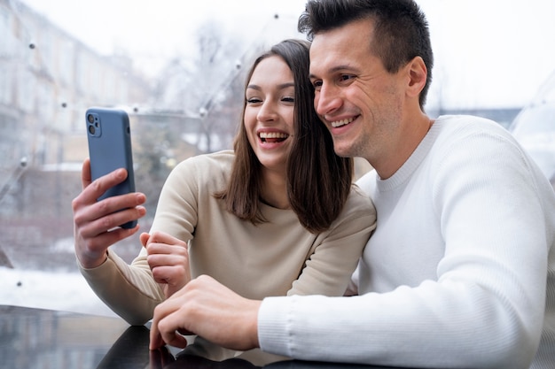 Free photo friends taking a selfie together after long time reunion