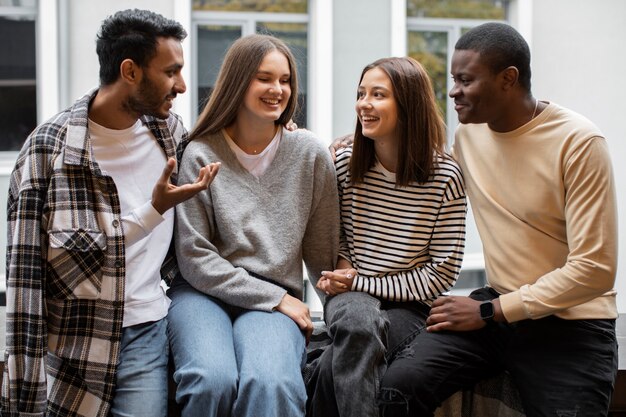 Friends talking and smiling at a get-together