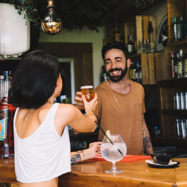 Friends toasting in bar