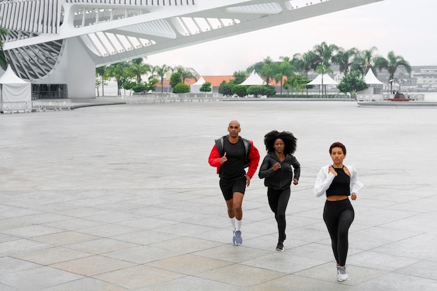 Friends training  together outdoors